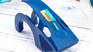 كيف يقوم موزع الشريط السدود الكرتوني Deli بتحويل تغليف الملابس ؟